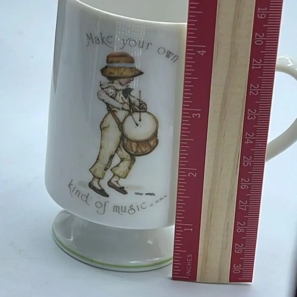 Holly Hobbie 1974 “ Make Your Own Kind of Music” pedestal cup.